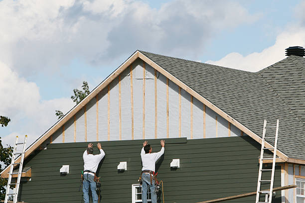 Professional Siding technician working in Bozman, MD